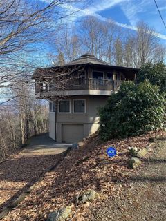 303 S Ridge Runner Road sold home in The Ridge Tops Of Hawks Nest, Burnsville, NC
