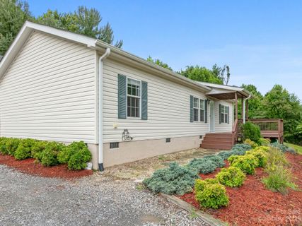 214 Rovingwood Drive sold home in Village Crossing, Waynesville, NC