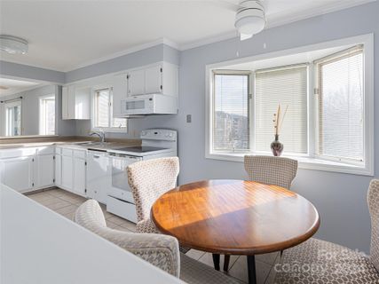 201 Racquet Club Road 14 sold home in Courtside Condos, Asheville, NC