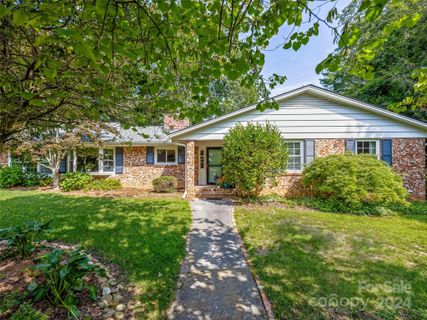 1220 Woodmont Drive sold home in Towne Forest, Hendersonville, NC