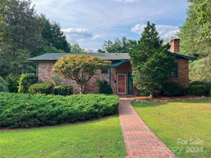 122 W Sweetbriar Lane sold home in Twelve Oaks, Etowah, NC