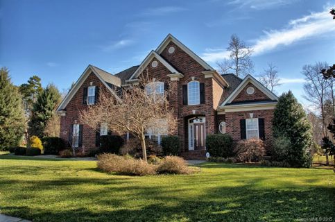 11305 Whispering Leaf Court