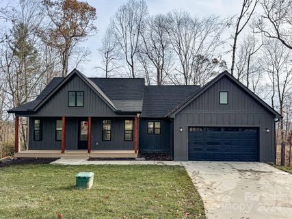 241 Byron Forest Drive sold home in The Cottages at Byron Forest, Horse Shoe, NC
