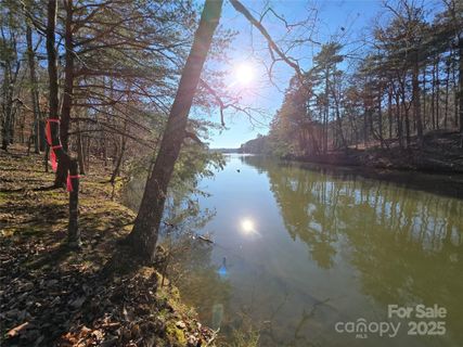 0 Whisper Lake Drive active home in Heron Bay, Badin Lake, NC