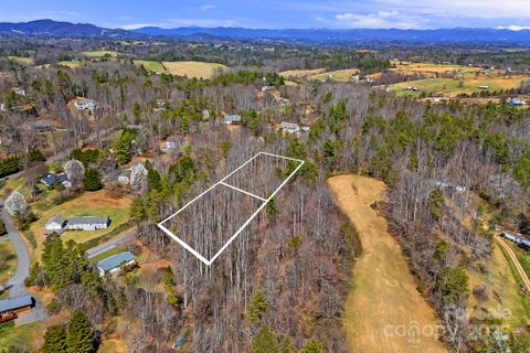 Lot 63 64 Quiet Woods Drive sold home in Whispering Pines, Leicester, NC