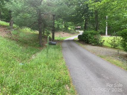 5 Friar Tuck Lane active home in Sherwood Mountain, Maggie Valley, NC