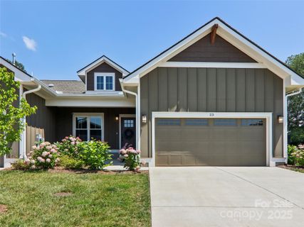 23 Cozy Cottage Way sold home in The Cottages At Averys Creek, Arden, NC