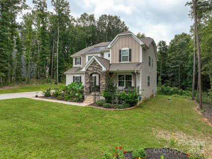 12009 Wild Ginger Lane active home in The Estates At Arlington Woods, Charlotte, NC