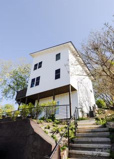 1057 Riverside Drive active home in Woodfin Land Company, Asheville, NC