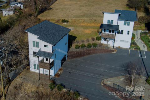 1061 And 1063 Riverside Drive active home in Woodfin Land Company, Asheville, NC
