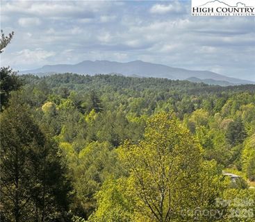 2070 Thoroughbred Way active home in The Coves Mountain River Club, Lenoir, NC
