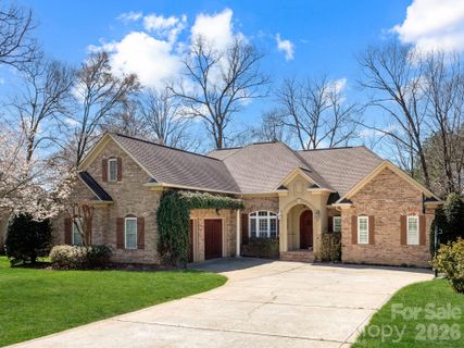 7919 Glen Abbey Circle active home in Cowans Ford Country Club, Stanley, NC
