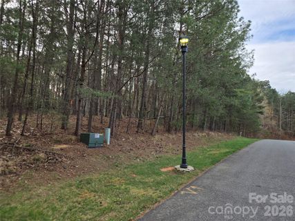 0 Whisper Lake Drive active home in Heron Bay, Badin Lake, NC