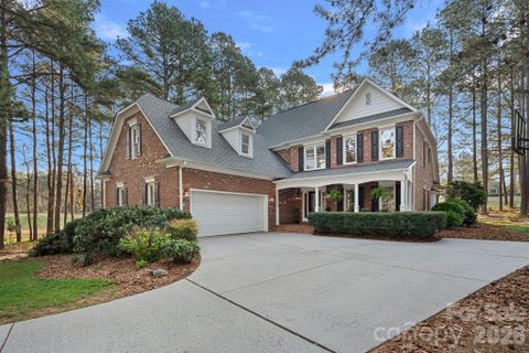 173 Yadkin Falls Road active home in Uwharrie Point, New London, NC