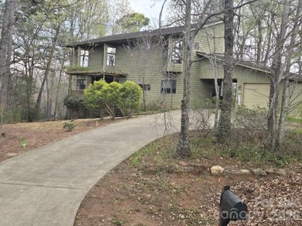 171 Wilson Court active home in Rumbling Bald On Lake Lure, Lake Lure, NC