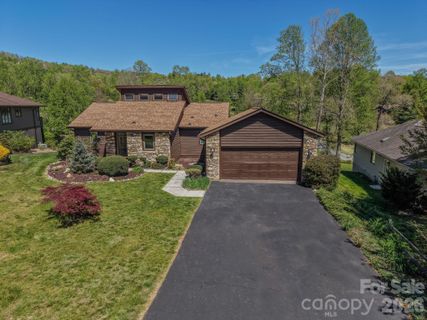 3104 Cove Loop Road active home in Cummings Cove, Hendersonville, NC