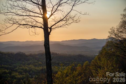 E11 Marble Heights Trail active home in The Boulders, Hendersonville, NC