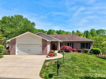 108 Fairway Knoll Drive active home in Cummings Cove, Hendersonville, NC