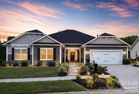 11756 Glenwood Drive active home in The Villages At Red Bridge, Locust, NC