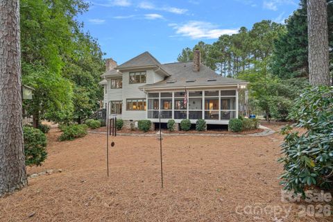 176 Yadkin Falls Road active home in Uwharrie Point, New London, NC