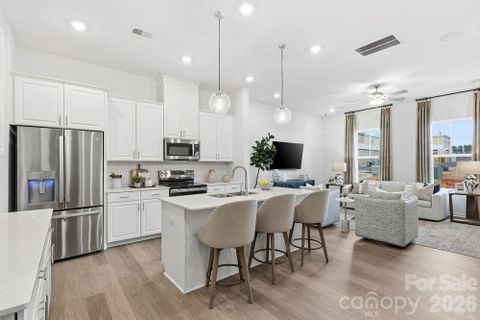 7306 Wake Way active home in Terraces At The Exchange, Indian Land, SC