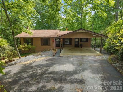 32 Honeysuckle Ridge Road active home in Knob Creek, Pisgah Forest, NC