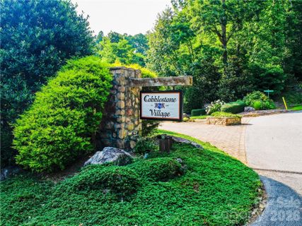 Lot 32 Freedom Trail Court active home in Cobblestone Village, Zirconia, NC