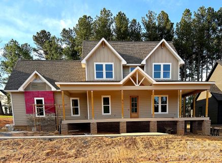 A home in Woodstone At Mills Garden, Statesville