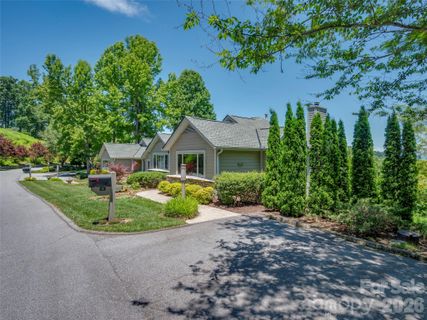 2 Meadow Ridge Lane active home in Champion Hills, Hendersonville, NC