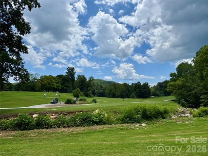 307 Fairway Drive active home in Rumbling Bald On Lake Lure, Lake Lure, NC