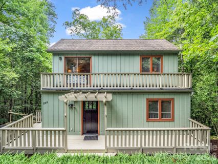 209 Dogwood Drive active home in Rumbling Bald On Lake Lure, Lake Lure, NC