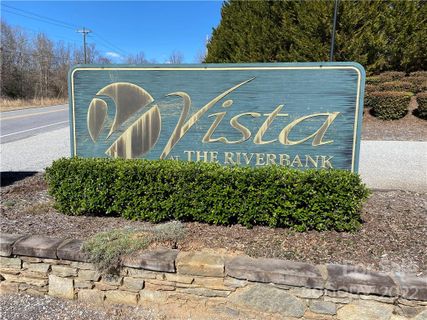 000 Bridge Lane active home in Vista At The Riverbank, Tryon, NC