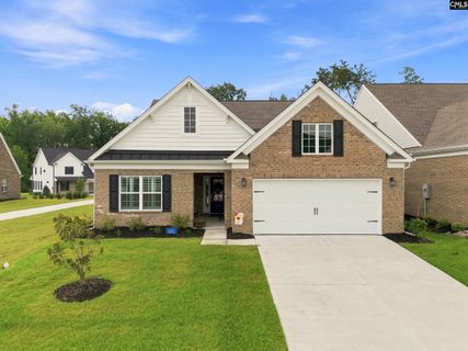 242 Backspin Drive active home in Northwoods Villas At Woodcreek Farms, Elgin, SC